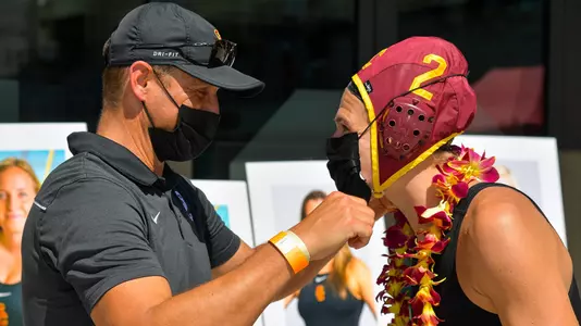 Marko Pintaric gives Maud Megens a hug on Senior Day