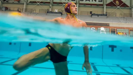 Tony Nardelli takes aim in a photo shoot showing below and above-water action