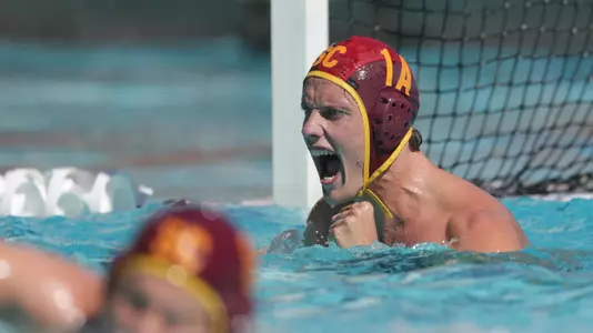 Nic Porter cheers after a big play at Uytengsu Aquatics Center.