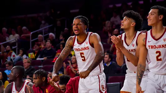 USC Trojans Basketball forward Isaiah White celebrates