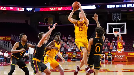 USC Trojans Basketball forward Drew Peterson shoots over Arizona State Sun Devils