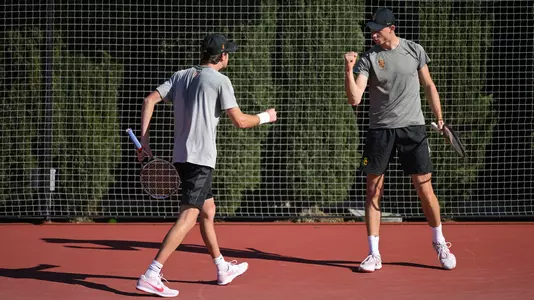 Ryder Jackson and Wojtek Marek celebrate during a doubles match at Marks Stadium