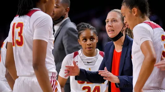 Lindsay Gottlieb talks with USC players during her first official game as head coach at USC.