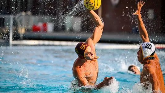 Marcus Longton shoots over a Long Beach State defender at Uytengsu Aquatics Center