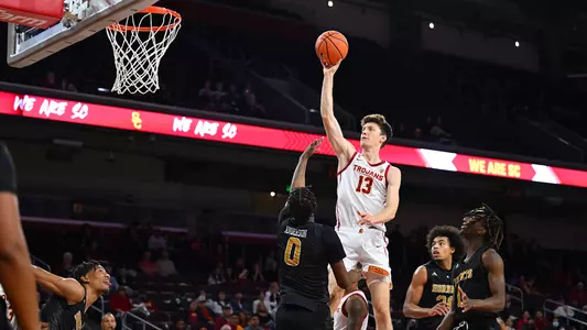 USC Trojans Basketball guard Drew Peterson shoots over Alabama State Hornets