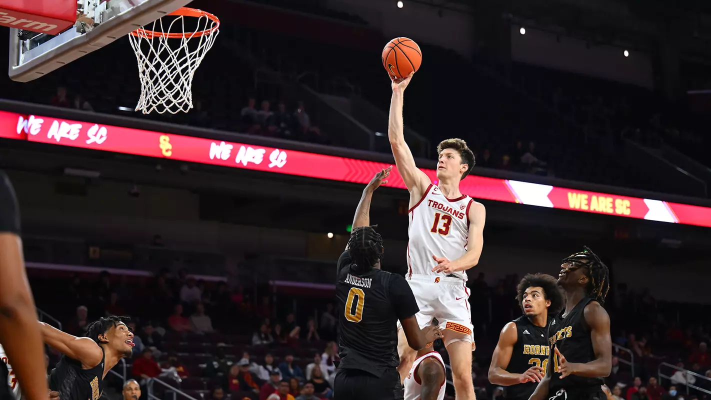 USC Trojans Basketball guard Drew Peterson shoots over Alabama State Hornets