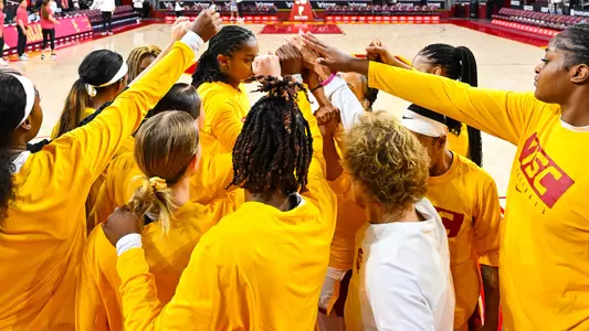 The USC team huddles up before its home opener vs. CSUB