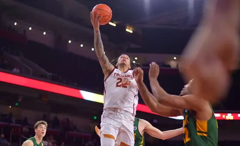 Tre White drives lane agaisnt Vermont