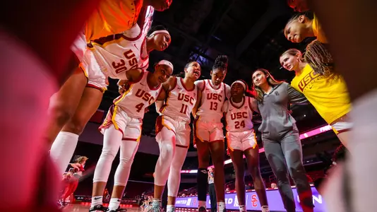 Destiny Littleton talks to her teammates during a pregame huddle Galen Center