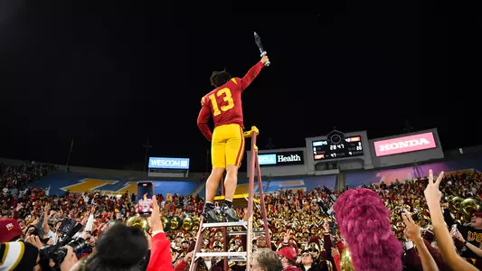 USC Trojans Football quarterback Caleb Williams leads marching band