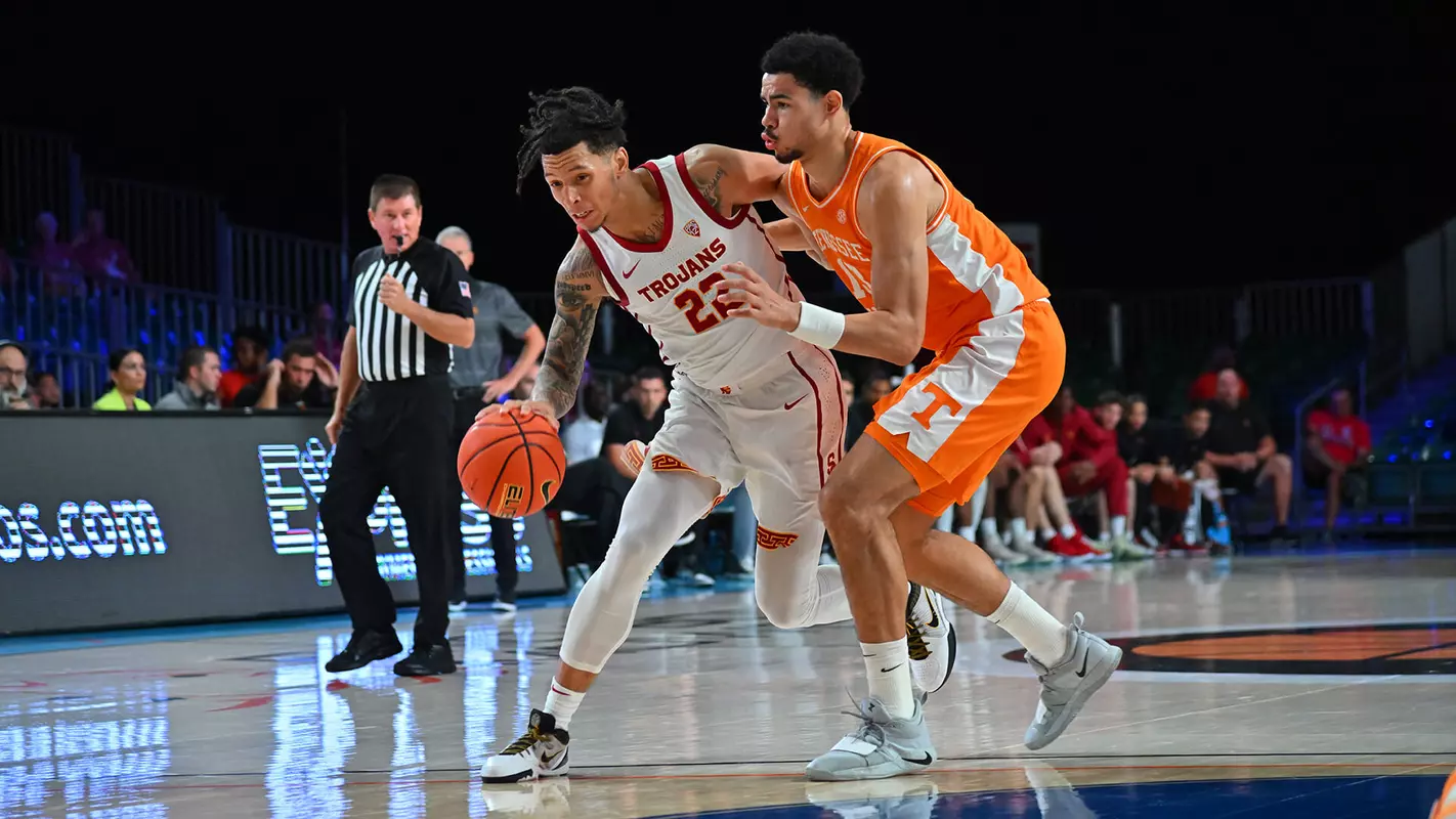 USC Trojans Basketball guard Tre White dribbles against Tennessee Volunteers