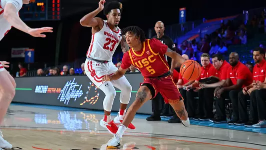 USC Trojans Basketball guard Boogie Ellis dribbles against Wisconsin Badgers