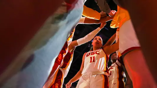 USC team huddles up before a game at Galen Center