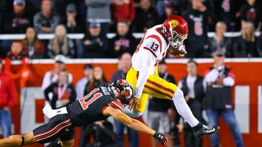 USC Trojans Football quarterback Caleb Williams runs against Utah Utes