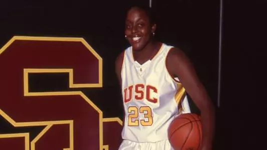 Ebony Hoffman poses with a ball in North Gym