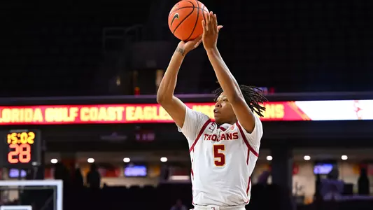 USC Trojans Basketball guard Boogie Ellis shoots over Florida Gulf Coast Eagles