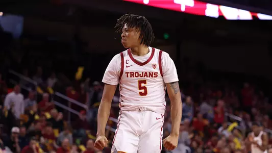 USC Trojans Basketball guard Boogie Ellis celebrates against Auburn Tigets