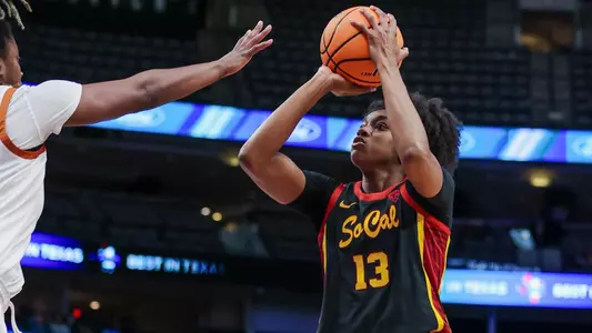 Rayah Marshall shoots over a Texas defender at America Airlines Arena in Dallas