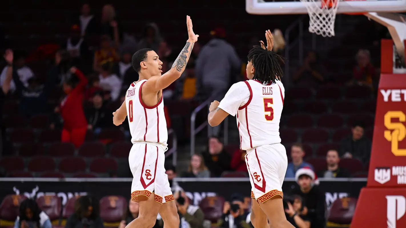 USC Trojans Basketball guards Kobe Johnson and Boogie Ellis celebrate