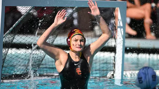 Carolyne Stern rises up in goal to defend a Cal shooter