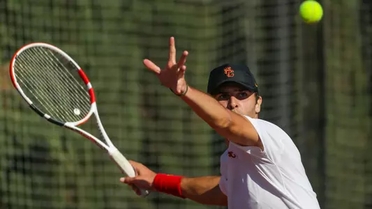 Stefan Dostanic winds up for a forehand in a match at Marks Stadium