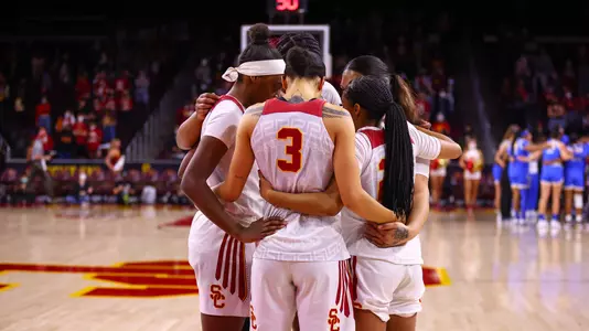 USC starters huddle up before a game against UCLA at Galen Center
