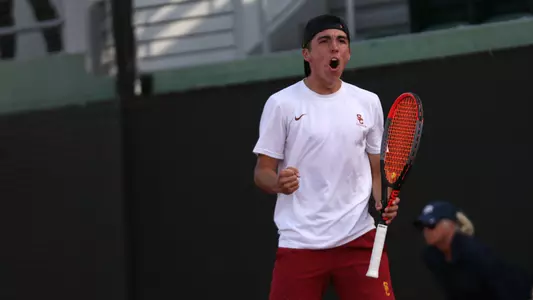 Ryan Colby cheers a point won during his victory vs Stanford at Marks Stadium