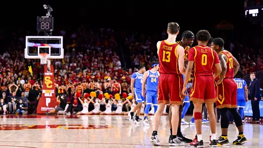 USC Trojans Men's Basketball team huddles