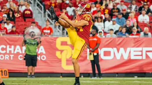 Ben Griffiths punts the ball