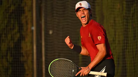 Bradley Frye cheers during his singles victory vs. USD at Marks Stadium.