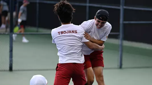 Ryan Colby celebrates his clincher with a teammate in the 2022 Pac-12 semifinals