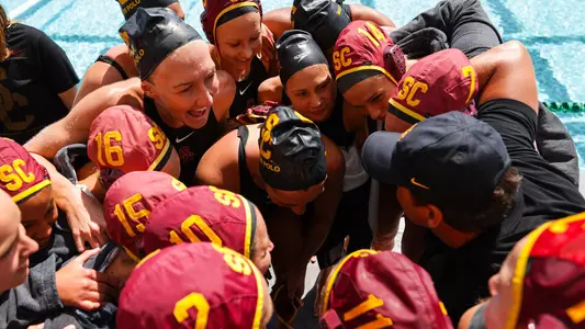 USC team huddles up before a home game against UCLA.