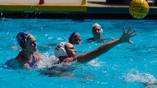 Tilly Kearns shoots a backhand shot vs. San Jose State