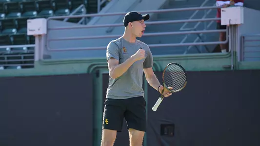 Wojtek Marek cheers a doubles point won at Marks Stadium