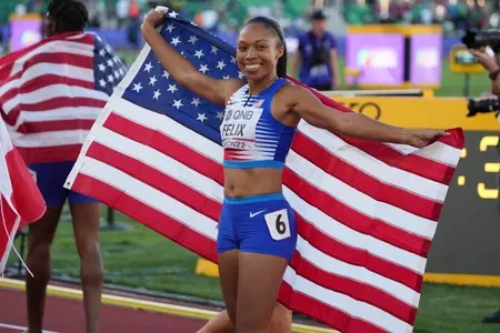 Allyson Felix with U.S. Flag