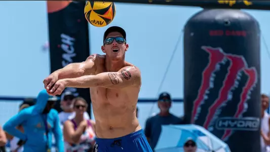 Tri Bourne digs a ball