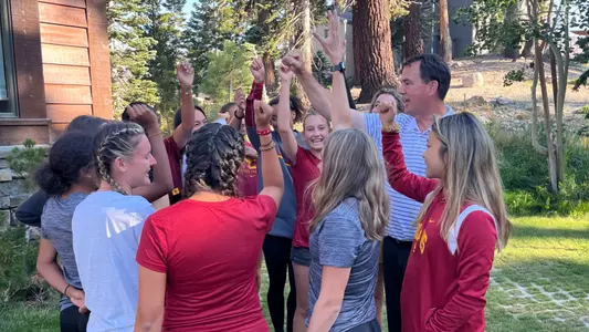 Team Huddle Arms Raised
