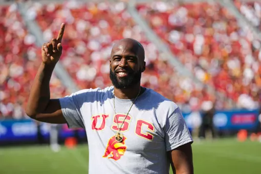 Donald Hurst, USC's first Superhero of the Game, poses on the field at the Coliseum