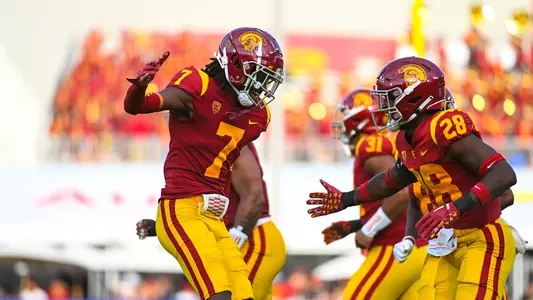 USC Trojans Football defensive backs Calen Bullock and Xamarion Gordon celebrate