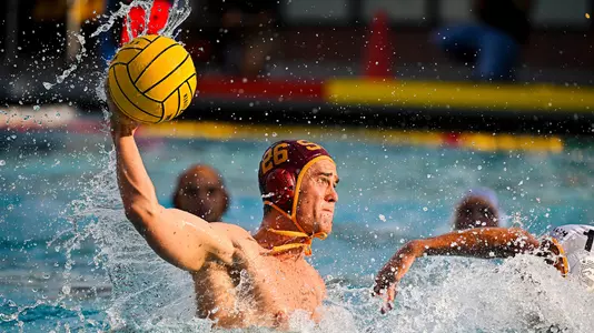 Chris Sturtevant take a hard shot vs. Long Beach State at Uytengsu Aquatics Center