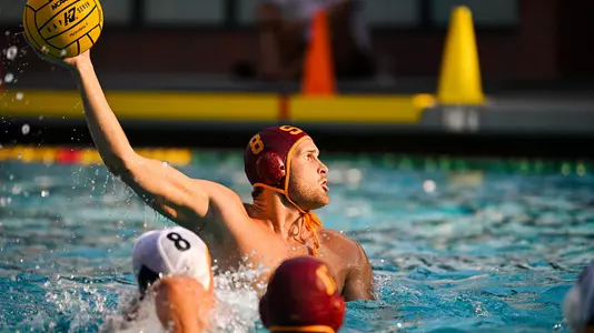 Jake Ehrhardt shoots the ball during a USC win over Long Beach State at Uytengsu Aquatics Center.