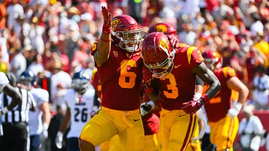 USC Trojans Football's Austin Jones and Jordan Addison celebrate vs. Rice Owls