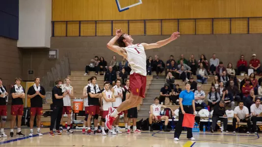 Dillon Klein serves the ball