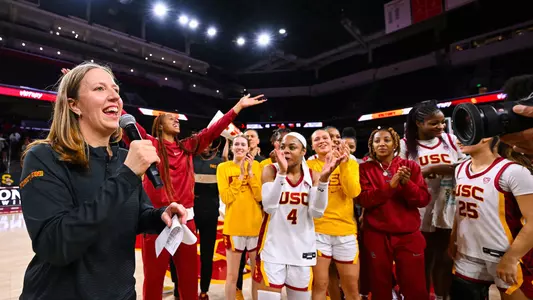 Lindsay Gottlieb and the team thank the crowd after USC's upset win over Stanford at Galen Center
