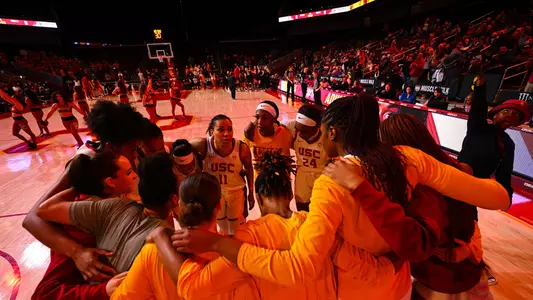 USC players huddle up on the court at Galen Center before an upset win over No. 2 Stanford