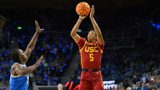 USC Trojans Basketball guard Boogie Ellis shoots over UCLA Bruins