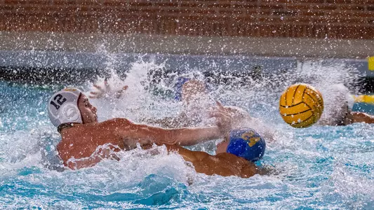 Max Miller shoots a backhand shot vs. UCLA at Uytengsu Aquatics Center