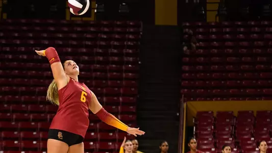 Ellie Snook serves the ball