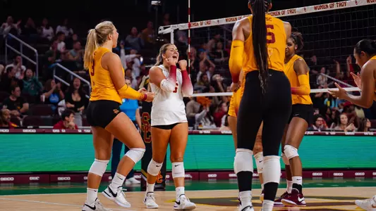 Team celebrates a point against Washington State