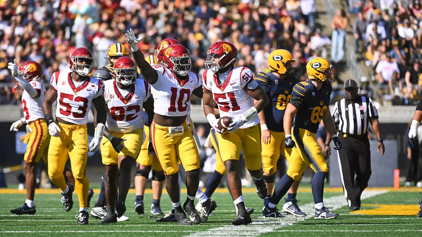 USC Trojans Football defense celebrates at California Golden Bears